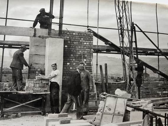 Workers on the roof of the Percival Whitley Centre in 1957