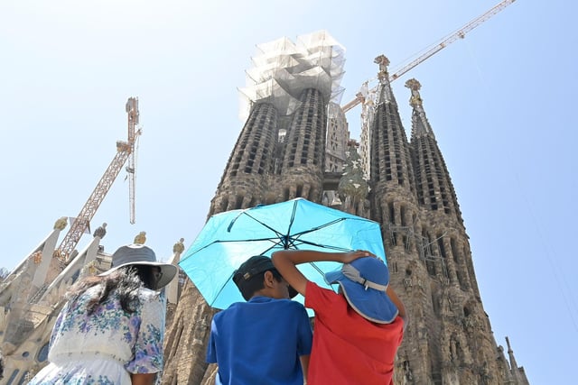 Even though the Spanish city of Barcelona is a great holiday destination in its own right, there are also many places to access by cruising from its port. (Photo by PAU BARRENA/AFP via Getty Images)