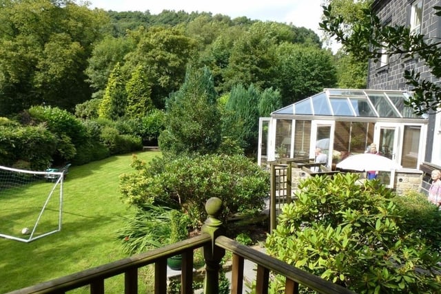 A conservatory has garden views, while the large lawn gives space for games or sports, or entertaining.