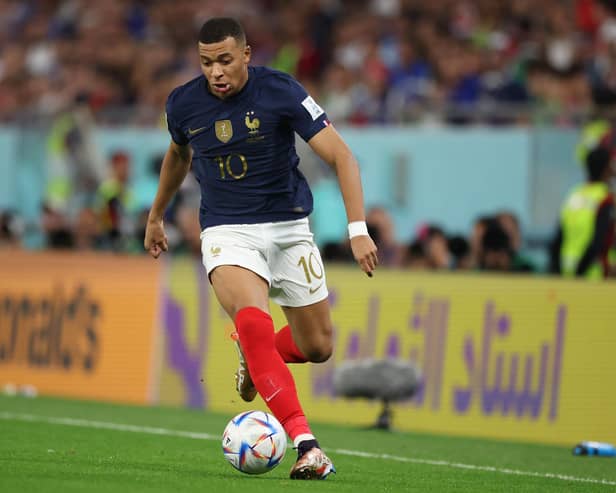 Kylian Mbappe of France controls the ball during the FIFA World Cup Qatar 2022 Round of 16 match between France and Poland at Al Thumama Stadium on December 04, 2022 in Doha, Qatar. (Photo by Alex Grimm/Getty Images)