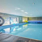 The indoor heated swimming pool has a remote control service for aqua aerobics and hydrotherapy, along with water jogging or running.