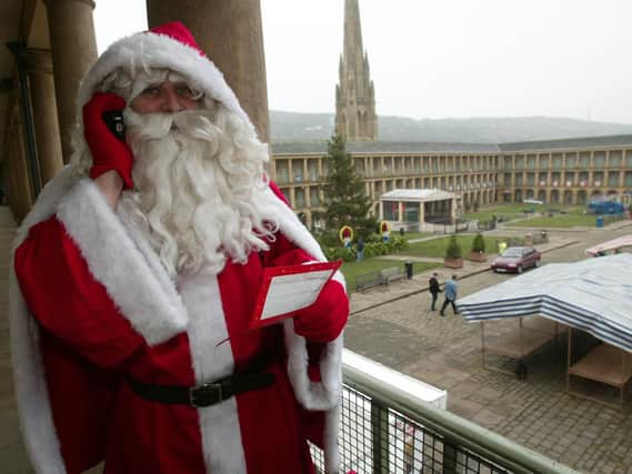 Father Christmas pops into the Piece Hall back in 2003.