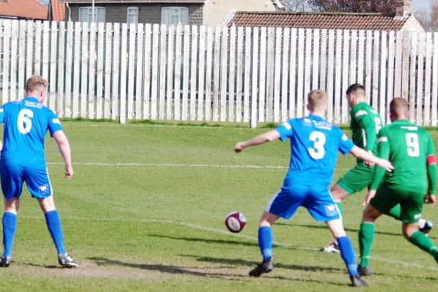 Kurt Harris scores for Brighouse on Saturday against Pickering Town. PIC: Steven Ambler.