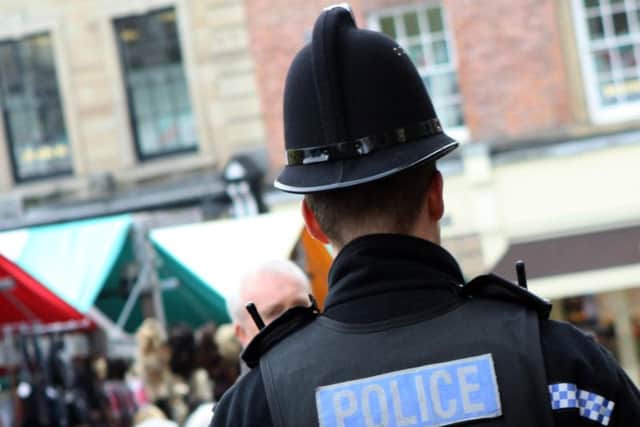 A suspicious hooded man was seen by police in Todmorden