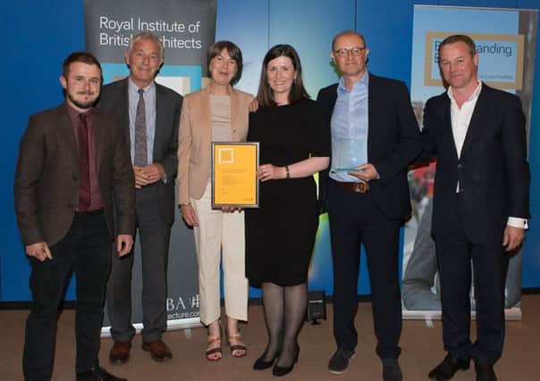 Representatives from Calderdale Council and LDN Architects with the RIBA Awards for the Halifax Piece Hall transformation and Central Library and Archives project.