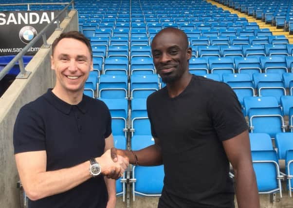 Town boss Jamie Fullarton with new signing Sanmi Odelusi