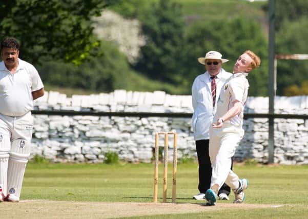 Actions from the ame, Mytholmroyd v Sowerby Bridge CC, at Mytholmroyd. Pictured is Lewis Mattock
