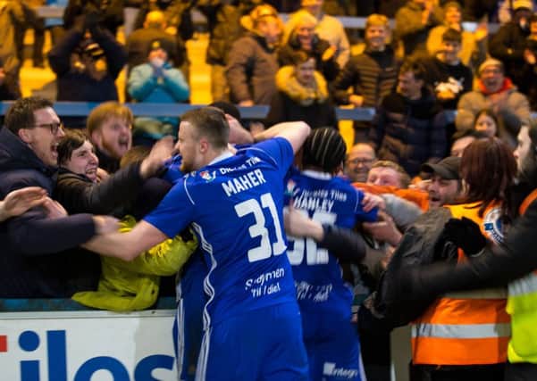 Actions from FC Halifax Town v Dag and Red, at the MBI Shay. Niall Maher celebrates a goal with the Town fans.
