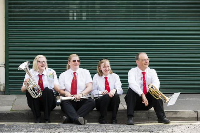 Brighouse Festival of Brass. Meltham and Meltham Mills Band members, from the left, Lisa Thorpe, Imogen Heywood, Hannah Talbot and Pete Hardy.