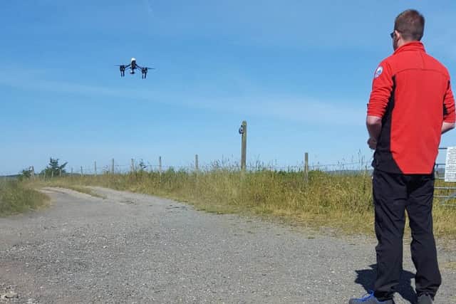 Joint training exercise using rescue dogs and new drone technology