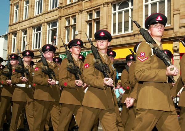 The Duke of Wellington's Regiment pictured marching through Halifax