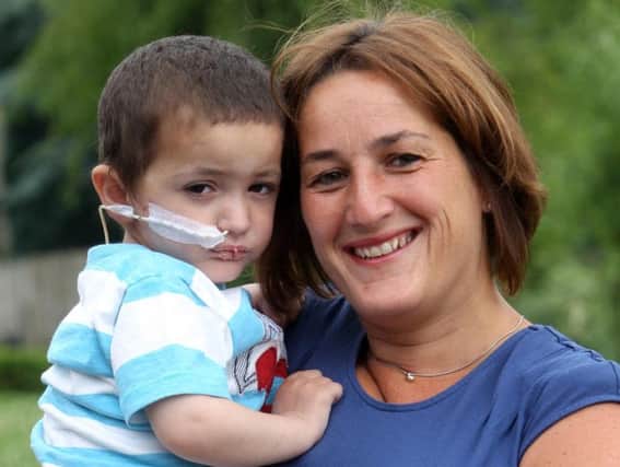 Jacob with mum Paula Howarth back in 2013