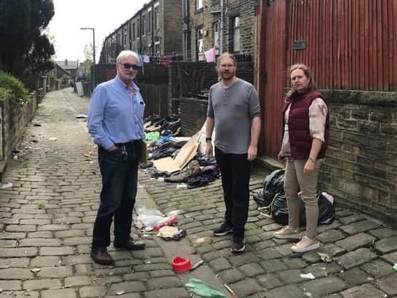 Liberal Democrat councillors Ashley Evans, James Baker (centre) and Amanda Parsons-Hulse have been campaigning against fly-tipping
