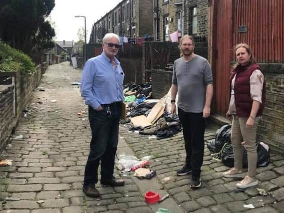 Liberal Democrat councillors Ashley Evans, James Baker (centre) and Amanda Parsons-Hulse have been campaigning against fly-tipping