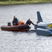 The restored Bluebird K7, which crashed killing Donald Campbell in 1967, takes to the water for the first time in more than 50 years off the Isle of Bute on the west coast of Scotland.
