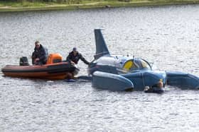 The restored Bluebird K7, which crashed killing Donald Campbell in 1967, takes to the water for the first time in more than 50 years off the Isle of Bute on the west coast of Scotland.