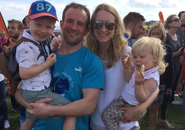 Nick and Rachel Smith with children Hadyn and Georgia after Nick completed the Great North Run in 2016.