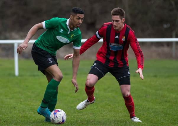 Actions from Halifax Irish v Ryburn United, football, at West Vale. Pictured are Anthony Brown and Oliver Brearley