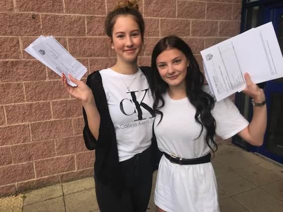 Calder High students Ellie Brooks-Hall and Lola Mariani, both, 16, collect their GCSE results