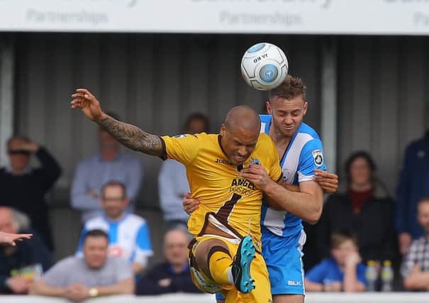 Picture by Gareth Williams/AHPIX.com; Football; Vanarama National League; Sutton United v Hartlepool United; 14/04/2018 KO 15:00; Knights Community Stadium; copyright picture; Howard Roe/AHPIX.com; Pools' Louis Lang wrestles with Sutton's Ross Lafayette