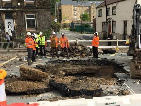 The hole that has been created in Burnley Road, Mytholmroyd (Calderdale Council)