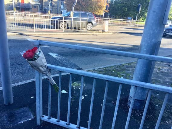 Floral tributes have been left at the scene at King Cross