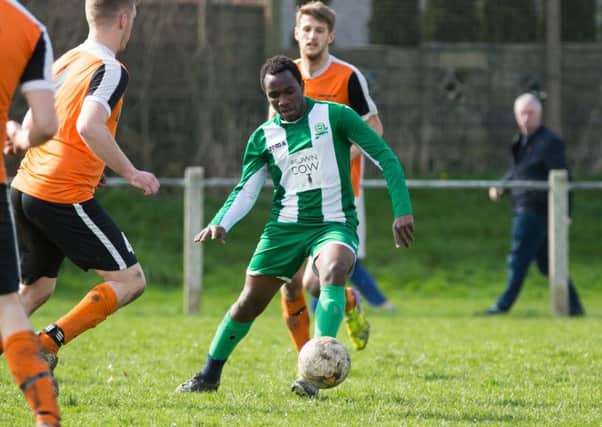 Actions from St Columba's AFC v Junction, at Natty Lane, Illingworth. Pictured is Touray Kautobay