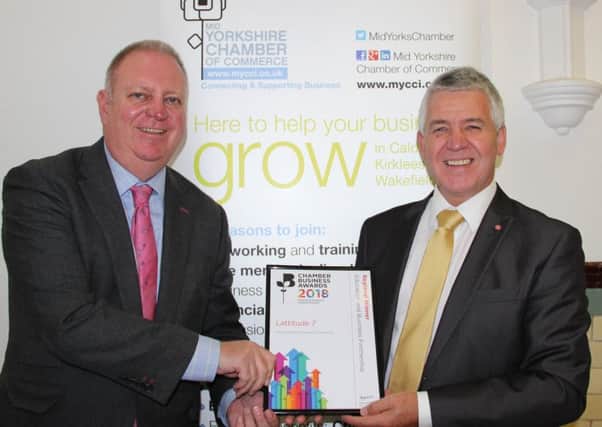Recognition: Dr Martin Haigh receives his award from Mid Yorkshire Chamber MD Martin Hathaway.