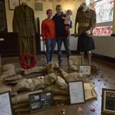 Samantha Oldfield and Craig Farren with their granddaughter Lela Kerr with the WW1 display at The Jubilee, Halifax.