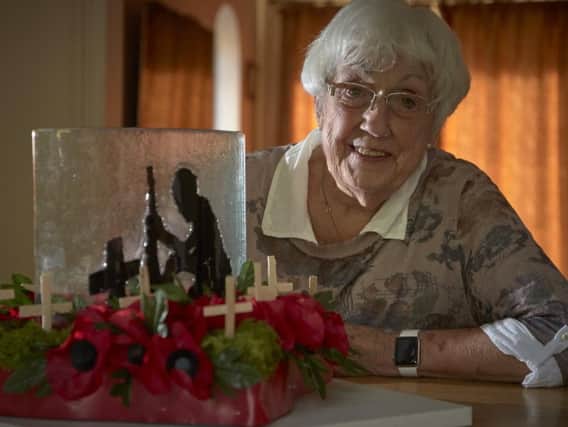 Hazel Brindle from Broomfield Avenue, Halifax  with her glass sculptures for Remembrance Day.