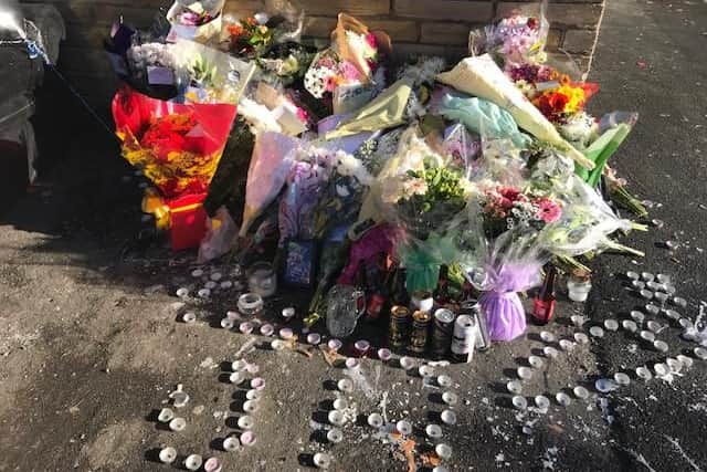 Floral tributes left at the scene of the fatal stabbing in Ovenden