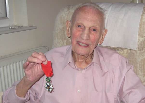 Top Honour: Mr Johnson pictured with his Legion d Honneur