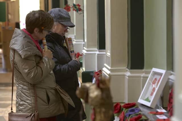 A poppy exhibition at Halifax Town Hall has drawn plaudits.