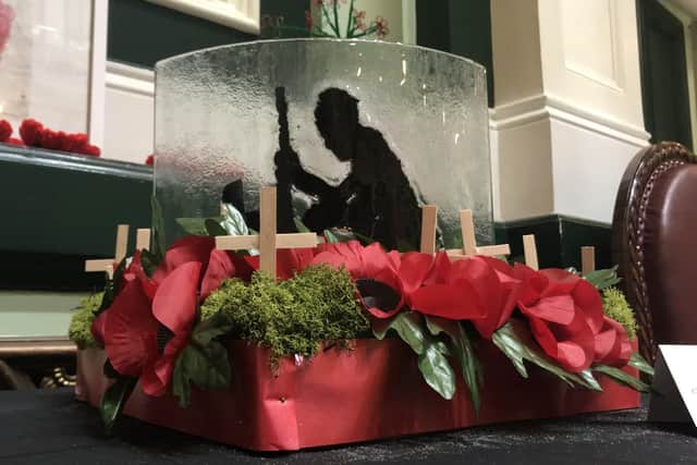 A poppy exhibition at Halifax Town Hall has drawn plaudits.