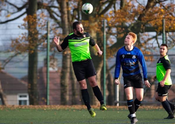 Actions from Shelf United v Elland, at Lightcliffe Academy. Pictured is Stefan Drakes and Harry Talbot