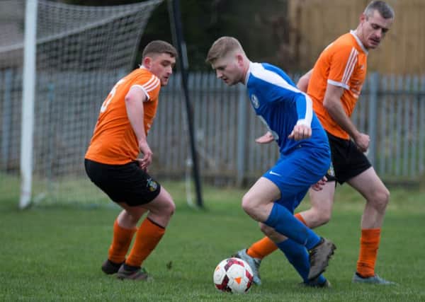 Actions from King Cross v Hollins Holme, at Old Earth, Elland. Pictured are Jacob Dobson and Sam Tattersall