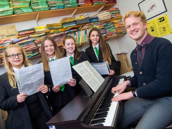 Charlie Rhodes has joined Rastrick High School as Director of Choirs