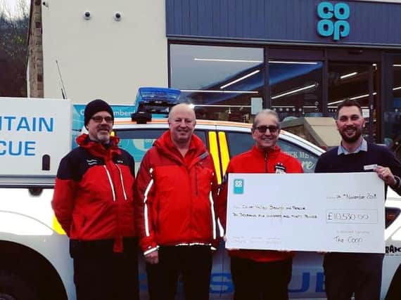 The Co-op MytholmroydLocal Community Fund donated 10,530.00 to the Calder Valley Search and Rescue Team