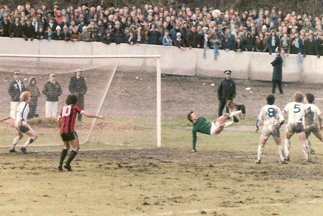 Town keeper John Kilner makes one of numerous saves in Halifax's win over Man City. Picture courtesy of Johnny Meynell.
