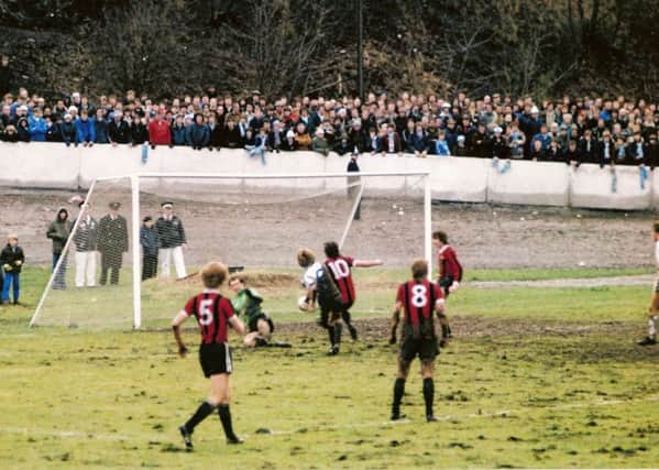 Paul Hendrie nets the winner in Halifax's win over Man City. Picture courtesy of Johnny Meynell.