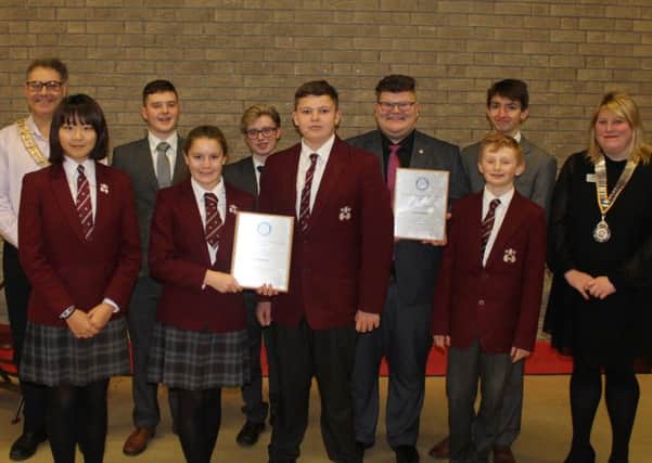 Winners: The two Rishworth School teams with mayor Marcus Thompson and Rotarys Lucy Hodgson.