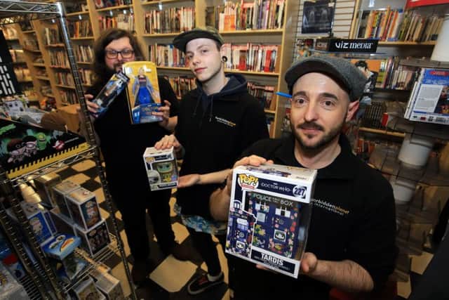 Doctor Who merchandise at Forbidden Planet International in Sheffield. Pictured are Richard Smith, Joe Smith and Dan Liles.