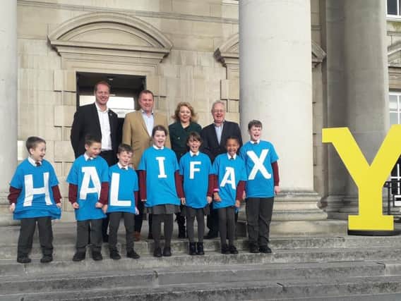 Pupils from Copley Primary School spell out Halifax at the Tour de Yorkshire announcement in Leeds