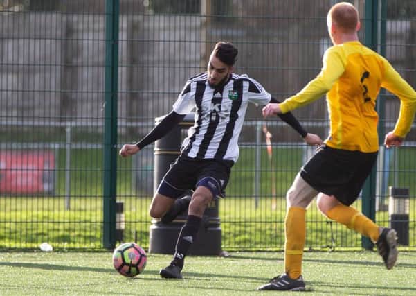 Actions from the game, Panda FC v Waiters Arms, Halifax FA Cup semi-final, at Calderdale College. Pictured is Hassan Jamil