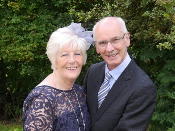 Derek Hitchcock who suffered a heart attack on Boxing Day three years ago, pictured with his wife Carol,
