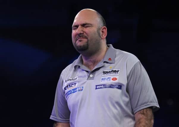CAMBERLEY, ENGLAND - JANUARY 13: Scott Waites of England reacts during his match against Glen Durrant of England in the 2019 BDO Lakeside Professional Men's Championship Final on Day Nine of the BDO World Darts Championship at Lakeside Country Club on January 13, 2019 in Camberley, England. (Photo by Alex Burstow/Getty Images)
