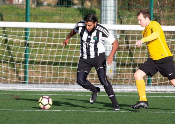 Actions from the game, Panda FC v Waiters Arms, Halifax FA Cup semi-final, at Calderdale College. Pictured is Mohammed Ozair and Dan Cook