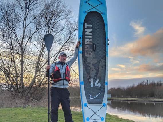 Paddleboarder becomes first to journey coast to coast