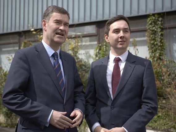 Justice Secretary David Gauke (left) at Brighouse with Jacob Hill of Offploy.