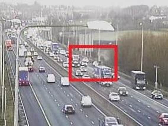 A broken down vehicle in lane one of the eastbound carriageway is causing lengthy tailbacks at junction 26 for Chain Bar. PIC: Highways England